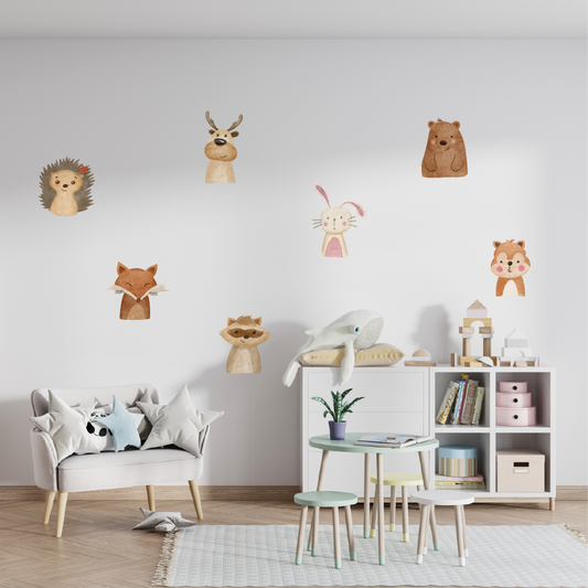 Magical forest theme wall decals featuring woodland animals in a nursery room setting.