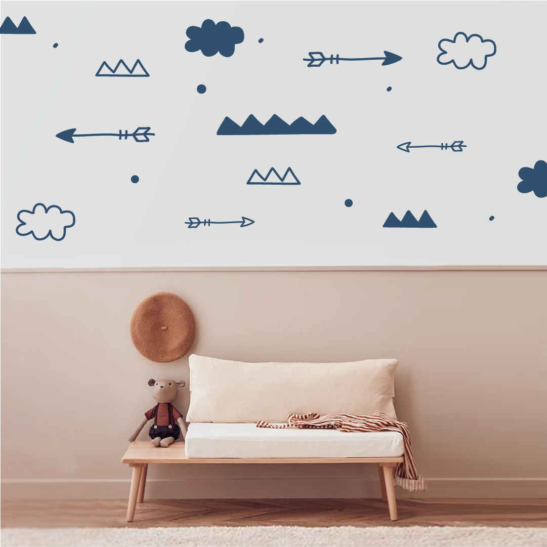 Nature-inspired arrow and sky wall decals in calming nursery setting.