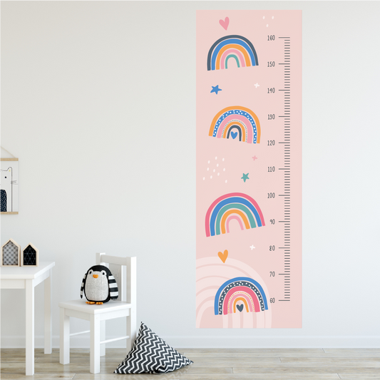 Rainbow Height Chart decal on a playroom wall with colorful rainbow design.